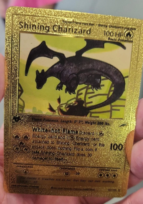 CharleeG83's tweet photo. SCAM ALERT!!! Do not buy any of these cards! I have been seeing a lot of these cards for sell at #ebay. These cards are 1000% fake, and only worth about $2 as a "Fan Art Base" card. Nothing more. Please do not get scammed! People are losing $100's on this scam! https://t.co/2M7d9wzDxY