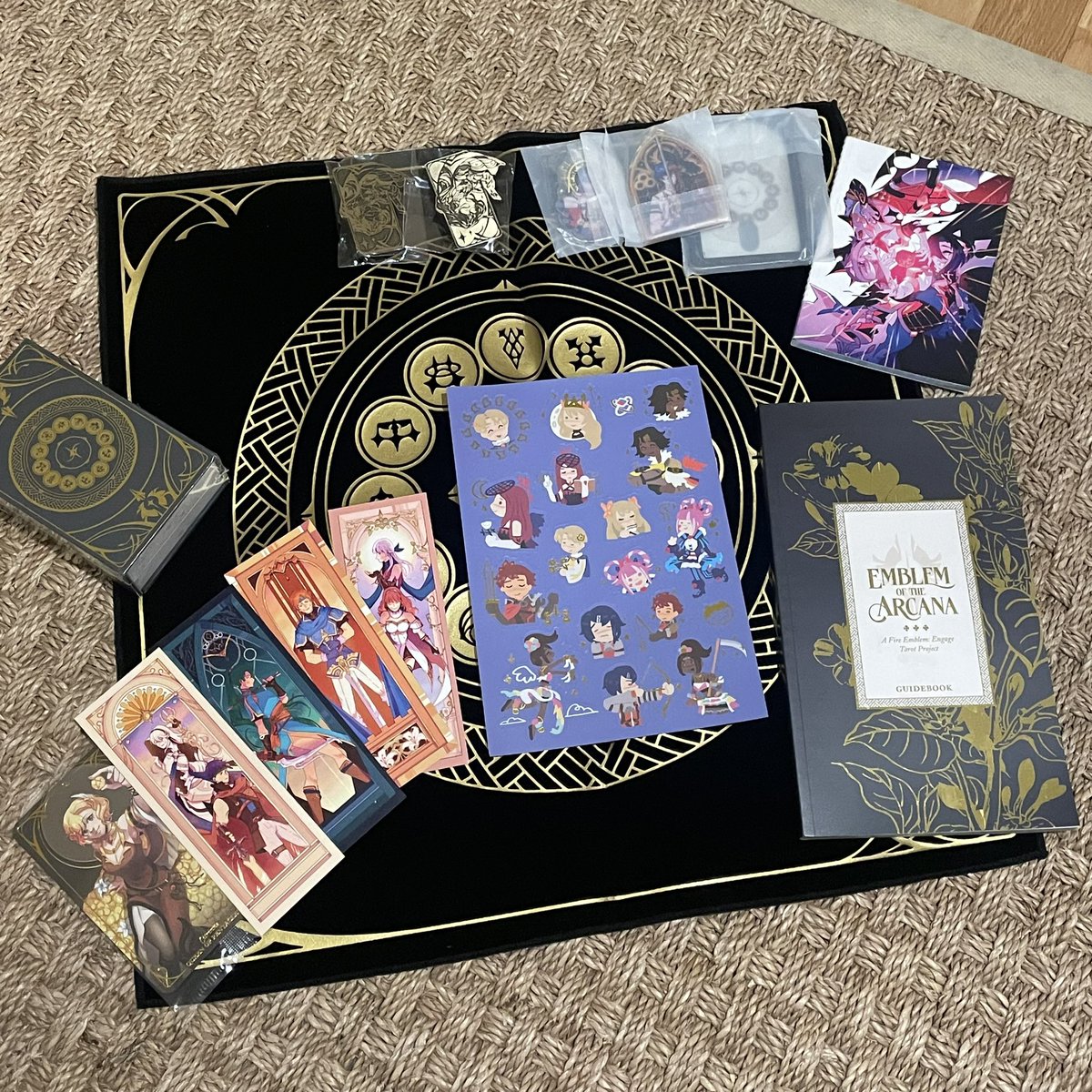 hypsclera's tweet photo. wheeee my contributor copy of @EngageArcana arrived! everyone’s works look lovely and i can’t contain my excitement at seeing my illustrations printed as a part of this project 🥹🃏 fe engage forever… 🫡 https://t.co/4oYUaFOb3u