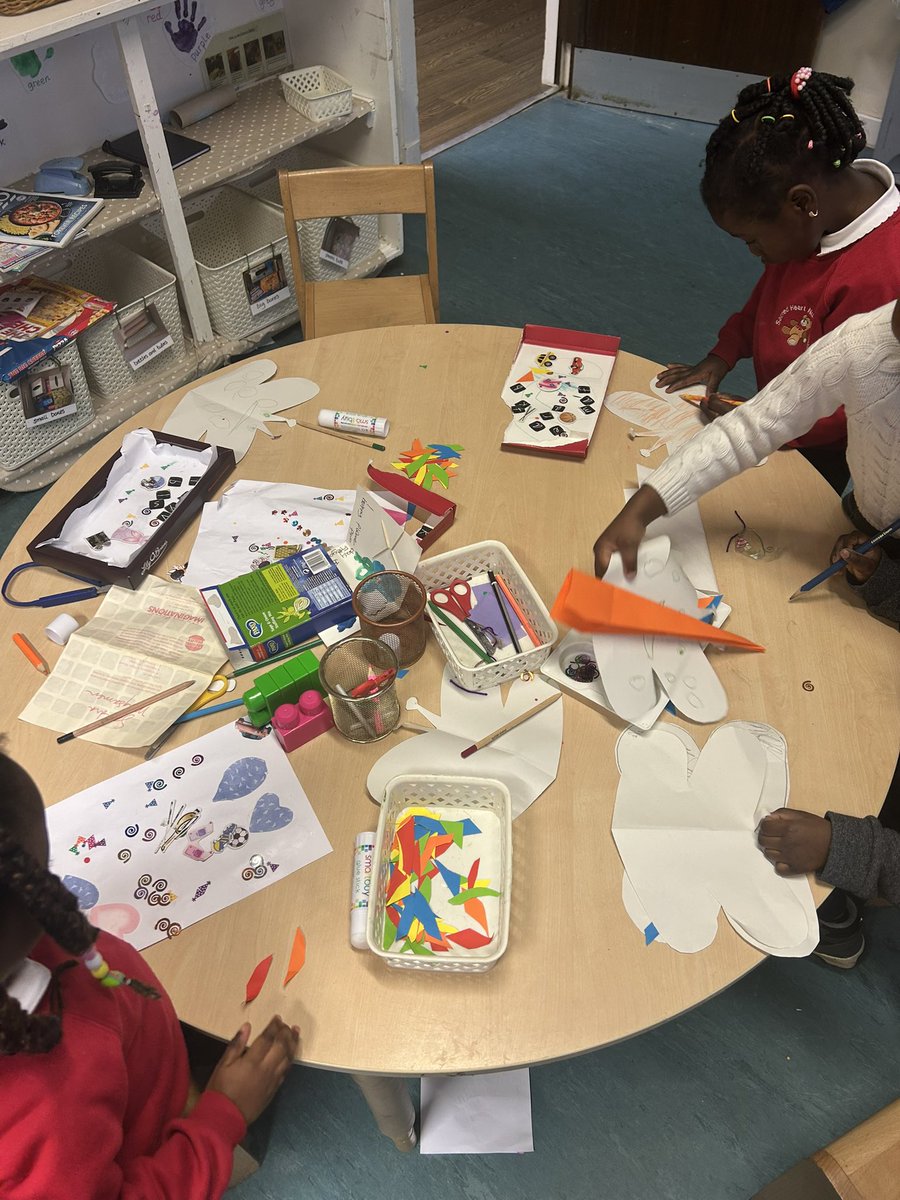 We are using a variety of materials to create our own collage pictures. “I can help you cut this shape”