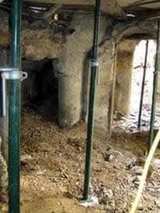 RobLooseCannon's tweet photo. Today, we visit an eccentric Irishman who inherited a mansion in London and dug a massive illegal underground complex beneath his gaff... just because! William Lyttle (1931–2010) was a civil engineer, and when destiny brought him to 121 Mortimer Road in Hackney during the swinging sixties he decided his fancy new digs 20 rooms weren't quite enough, so he excavated a wine cellar in the basement. 

So far, so sane. However, Lyttle discovered that digging was strangely stimulating for him. He said he'd "found a taste for the thing." So, his little dabble with making a single subterranean room turned into a forty-year addiction. The Irishman soon mined not only his own grounds but single-handedly generated a massive, multilevel tunnel complex that would put an ant colony to shame. 

His labyrinth boasted lofty rooms, and grand underground avenues 18 metres (59 ft) long. Contrasting this were little shafts barely a child's height. Most were lit with adhoc electrical lighting. 

Foreshadowing the Shawshank Redemption or perhaps inspired by the Great Escape, William Lyttle dumped the dirt discreetly about his garden and local parks. However, in a possible symptom of his mental health, he also filled entire rooms of his above-ground domicile. So even as his secret project flourished, his once fine mansion fell into disrepair.

Obviously, this improvised underworld was a very dangerous undertaking. Wrecklessly, the adventurous civil engineer invaded the earth beneath his wealthy neighbours' homes too and excavated as deep as the water table. His greatest and most illegal excavation connected his mansion with the local Dalston Lane rail tunnel.

Inevitably, the project aroused unwanted attention. Yes, there had been rumours the eccentric Paddy was up to something. Considering the times, it would've been amazing if he wasn't considered a possible terrorist by Scotland Yard. 

But the penny dropped when a local publican expressed concerns about his cellar collapsing. The area's water supply became disrupted, and lighting a mini underground village drained local power supplies. Then, the understandable complaints rolled in. Bizzare noises in the nighttime. Inexplainable sinkholes appearing in neighbours' flowerbeds, gaping chasms in the leafy yuppie streets.

Incredibly (if you've never worked for Fingal County Council) despite Hackney Council receiving tip-offs and serious complaints, they did feck all for decades. Eventually, an ultrasound inspection of the grounds of Lyttle's gaff was carried out in 2006, and the rest is history. Sadly (for him), Lyttle was evicted in 2006. 

Then Hackney Borough Council began the mammoth mission of backfilling the Mole-mans tunnels with aerated concrete. Over 33 tonnes of soil and debris were removed! In 2008, the High Court made him pay £293,000 in expenses. They generously housed Lyttle in a hotel for three years. Finally, he was rehoused on the top floor of a  high-rise apartment building, hoping this would put an end to his antics. A not-so-random inspection of his new "digs." The inspector discovered he had knocked a hole in a dividing wall!
 
We'll give the last word to "The Mole Man of Hackney" himself. 
When journalists asked why he did it all, he said, "I'm just a man who loves to dig. There is great beauty in inventing things that serve no purpose."