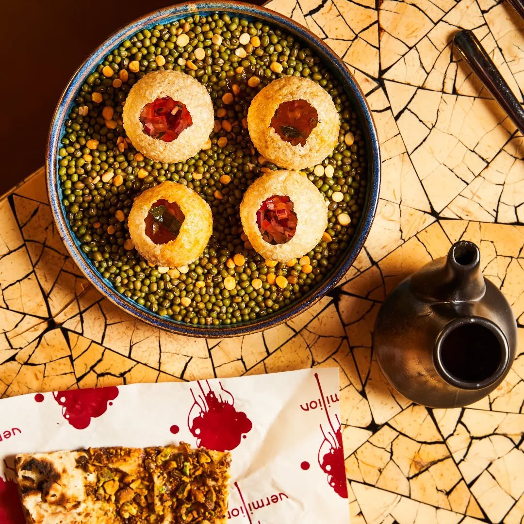 Our Rasam Pani Puri is the perfect harmony of crunch, spice, and flavour - a bold twist on the classic snack you love!

Make sure to try it the next time you're dining at Vermilion.