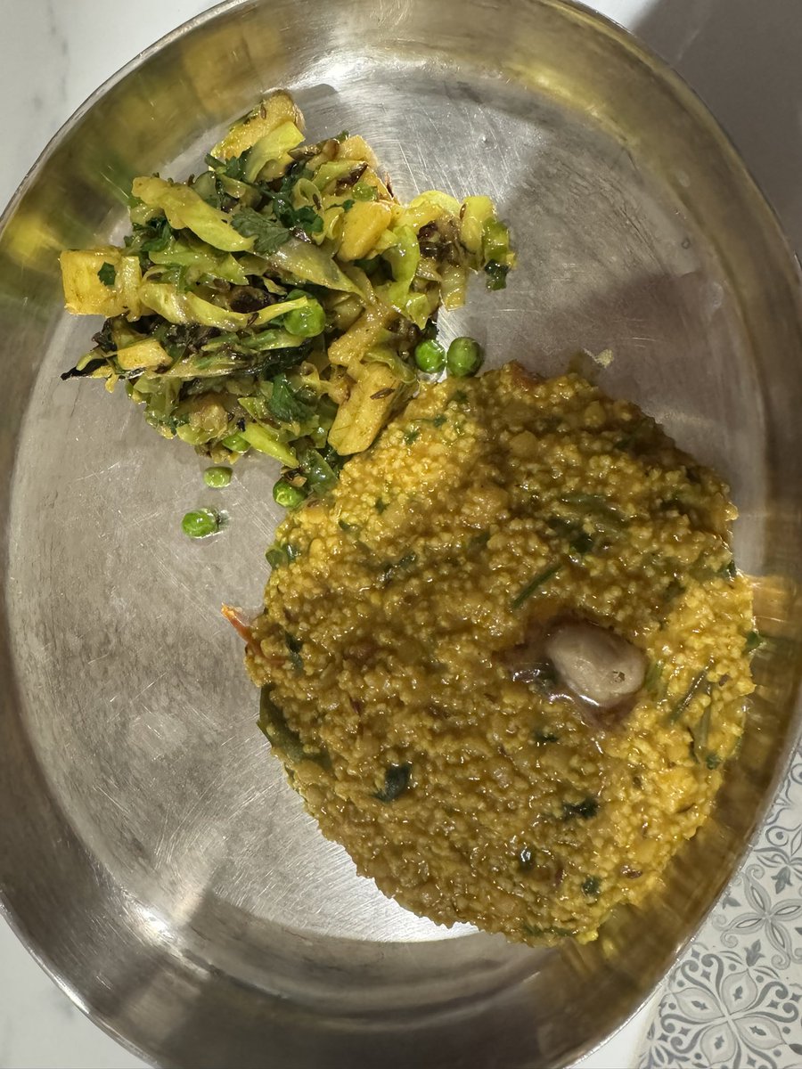 Devilinlko's tweet photo. Foxtail Millets khichri with ghee, cabbage sabji #milletsofindia https://t.co/PY8ZqFAoWG