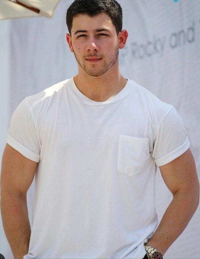 A man in white Tee
#nickjonas #nickjonasstyle