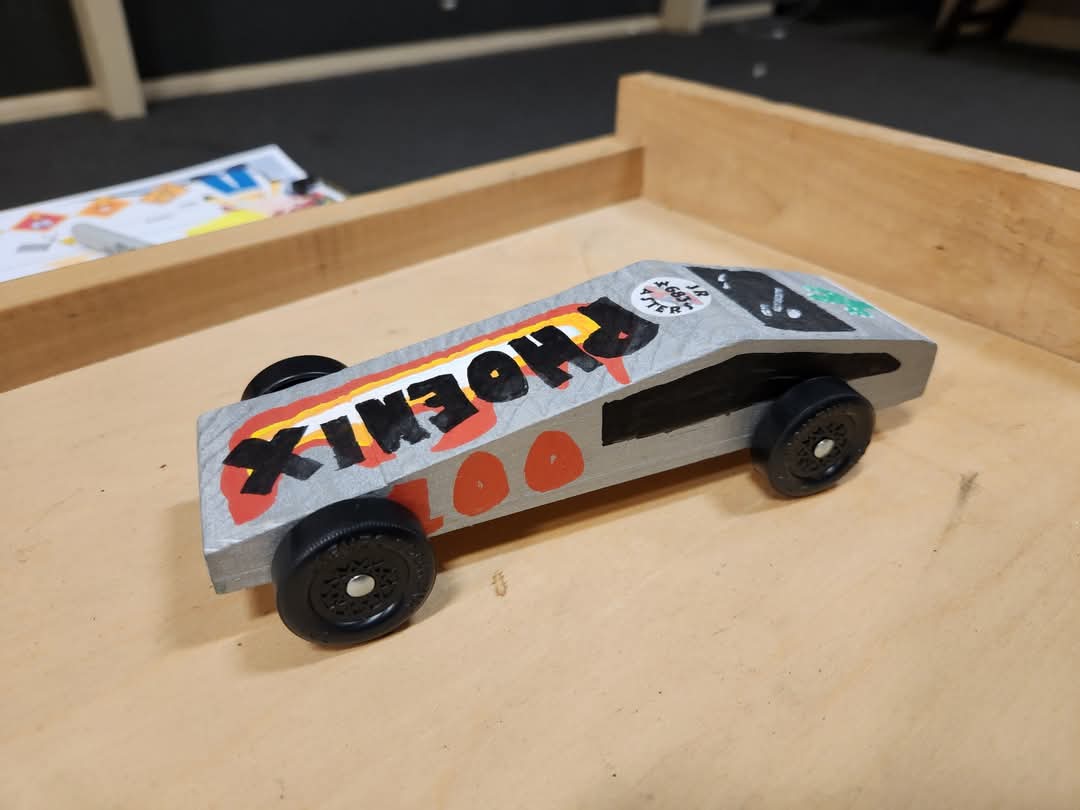 lociceroad's tweet photo. @elonmusk check out my sons pinewood derby cybertruck. He got 3rd place in his race! https://t.co/mE6PDEAi3F