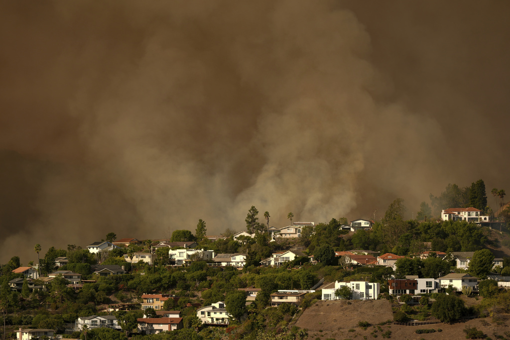 KTLA's tweet photo. A concerning update from CalFire:

"A FIRE WEATHER WATCH will begin at 6:00PM tonight and will remain in effect through 6:00PM Sunday night. Moderate to strong Santa Ana winds are likely to return Tuesday and Wednesday, creating critical fire weather conditions." #PalisadesFire

Live coverage: https://t.co/v9hSj9k6g3

(AP Photo)
