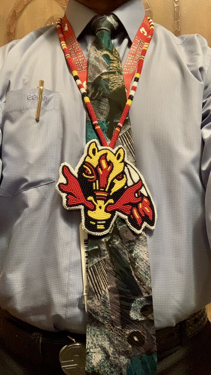 RickTulsie's tweet photo. It’s #Flames #Blasty jersey AND our #indigenous game tonight
I’m honored to be wearing this beautiful hand made medallion by a local #Siksika artist
This was gifted to me by #DrTylerWhite in recognition. As he says. “For my kindness & charity work” here in #Calgary
#NHL #Fun https://t.co/PSjQKnCCge