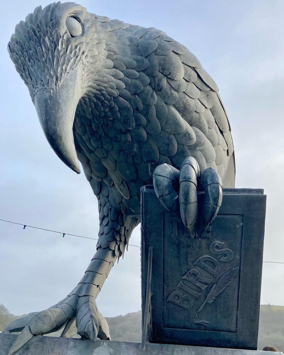 TulipHeather's tweet photo. I know I’ve used this one before, but it fits the theme! 
Black bird with a book! 
Rook With A Book sculpture by Thrussels, Fowey, Cornwall, in honour of Daphne du Maurier, who lived nearby 🙂
#WeekB 
#AlphabetChallenge https://t.co/nuSh85mUCm