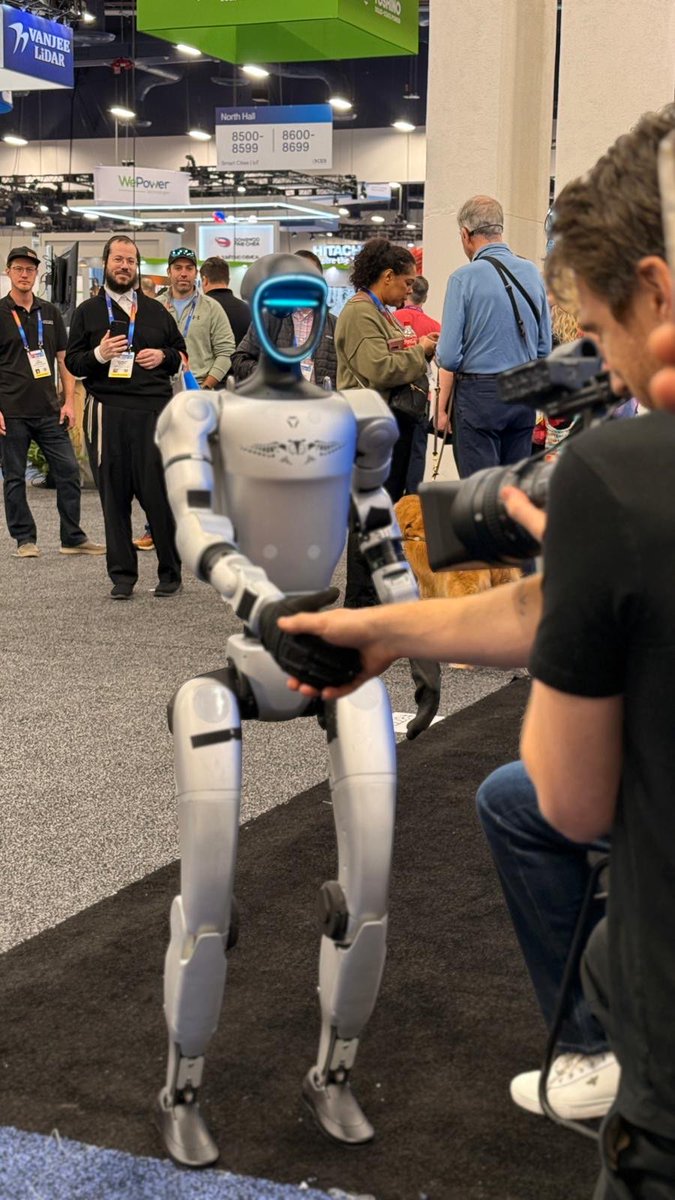 parallelao's tweet photo. CES 2025 Recap:

This was my 4th year exhibiting at CES, and the innovation this year was unmatched. Here's what stood out:

🤖Humanoid Robots Stole the Show: Biased, but the Unitree demos were unbeatable. The G1 kept 30-40 people around our booth at all times, interacting nonstop. No other robots walked and engaged as dynamically.

🌐Global Interest in Humanoids: Top companies from across industries showed keen interest in humanoid robots. The future feels closer than ever. 1:1 humanoid robots to humans is an understatement.

🌟Jensen’s Presentations: Absolutely mind-blowing. The new GPUs are a game-changer—excited for what they’ll unlock.

🚝AI Everywhere: AI was woven into every corner of CES, from earbuds that translate any language to groundbreaking applications across industries.

👿 We demoed Divine and Omni on a 20 foot LED wall inside a custom Unreal 5.5 environment. Divine can destroy environments, Omni can rebuild them. They both can interact in the world, move and perform tasks. Everyone who interacted with them were scared shitless. We had to turn them off. 

❤️See you all next year! We are coming back with an absolute show stopper.

I would love to connect with and collaborate with any teams building in this arena!
