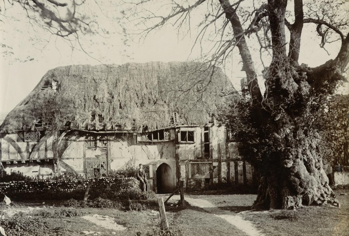 Alfriston Clergy House in East Sussex was the first building acquired by the <a href="/nationaltrust/">National Trust</a>, founded #OnThisDay in 1895.

This photograph shows the 14th-century building before it was restored in 1898. The building is a rare surviving example of a Wealden hall house.