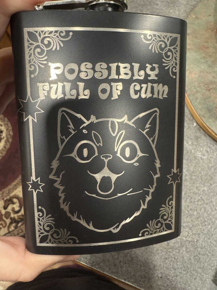 KittyBeale's tweet photo. These flasks I’m engraving are getting stranger the closer I get to VF. 

#furry #vancoufur2025 #laserengraving https://t.co/vXZ5YkZNY9
