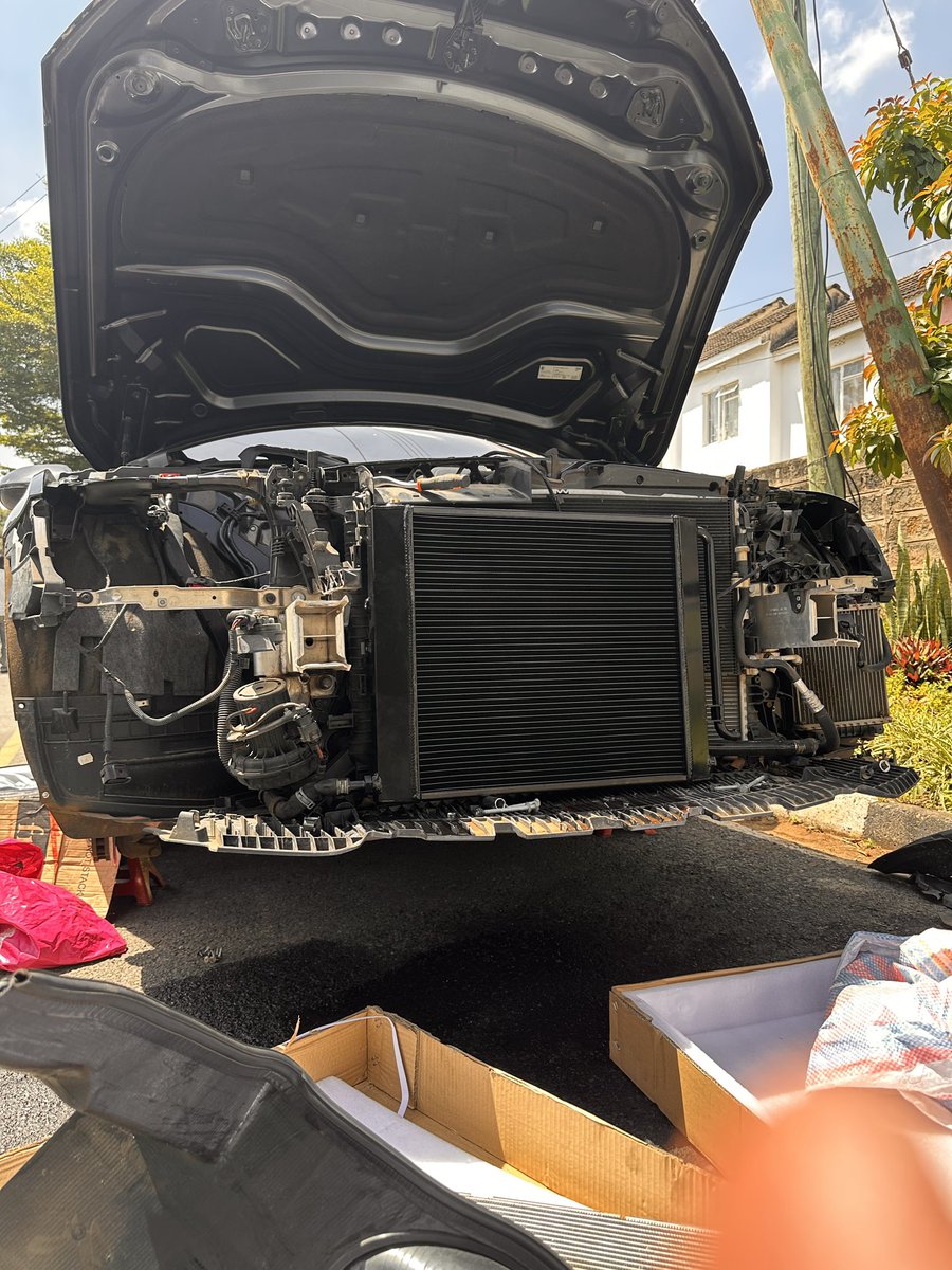 Byron_Kr's tweet photo. A thread on what we accomplished yesterday as we take the car to stage 2. Powered by CENOS Tuning. We started by taking off the stock Heat Exchanger in frame 1. To fit the Mercracing upgrade, the crash bar had to be drilled for the bigger Heat Exchanger (HX) to be mounted on it. https://t.co/z5jmfTeczq