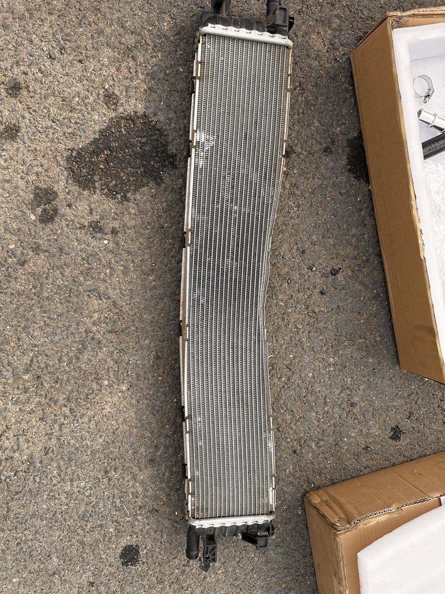 Byron_Kr's tweet photo. A thread on what we accomplished yesterday as we take the car to stage 2. Powered by CENOS Tuning. We started by taking off the stock Heat Exchanger in frame 1. To fit the Mercracing upgrade, the crash bar had to be drilled for the bigger Heat Exchanger (HX) to be mounted on it. https://t.co/z5jmfTeczq