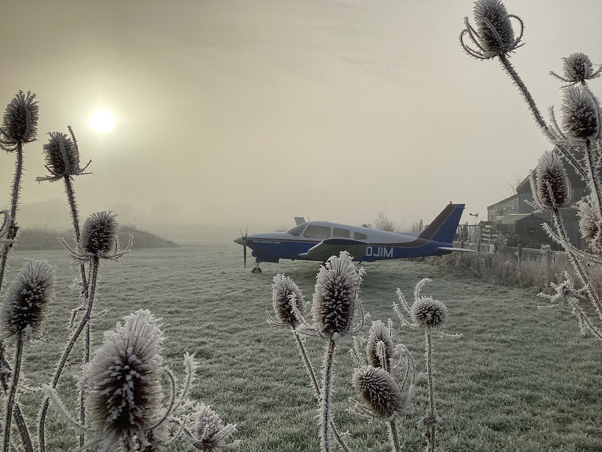 MikeJStones's tweet photo. No flying fun this freezing, foggy morn at @DamynsHall in Essex. This chilly Piper Arrow braves the sub zero temps but the @TigerClubUK’s Super Cubs are tucked up in the hangar. Dreaming of sunny summer days and “landings as soft as the morning dew kissing the face of a rose.” https://t.co/bAo17F3pQ6
