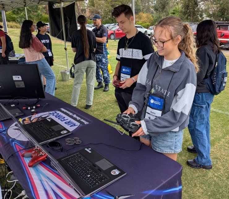 AUADRT's tweet photo. We're back, ripping a track with @NYSFoz! @AusAirForce #DroneRacing Team launched a great demo for #NYSF at #ANU this week! Such great #STEM'ers with great questions!
#SendIt!
@ChiefAusArmy @AustralianArmy @FORCOMDAusArmy @SEAC_ADF @CAF_Australia @RAAF_ACAUST @WOFFAF @RAAF_ACWOFF https://t.co/9VS2vk7svO
