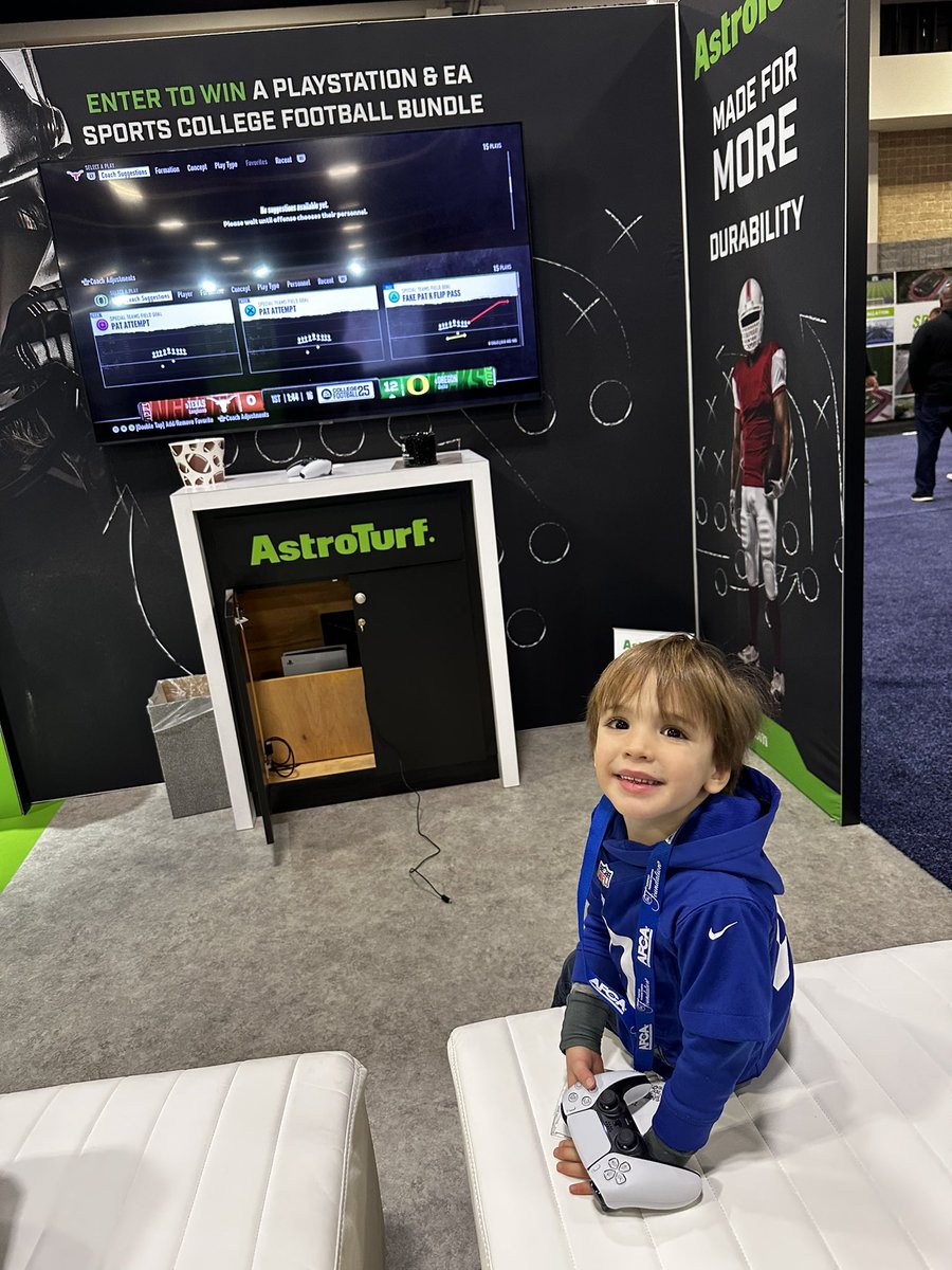 SchwartzSide's tweet photo. Louie enjoyed his first AFCA for @UCSSPIRIT, Thank you @AstroTurfUSA for the distraction 😂#AstroTurfAFCA2025 https://t.co/VhFaGas5ve