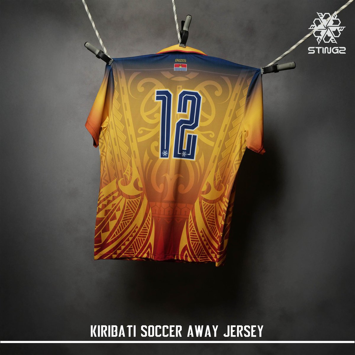 Stingz™️ is pleased to unveil the official Kiribati Islands Football Federation (KIFF) away jersey for 2025!

Like the new home jersey, the new away jersey is also inspired by Kiribati’s national flag, but in a predominantly sunset yellow and orange colourway, with navy shoulder