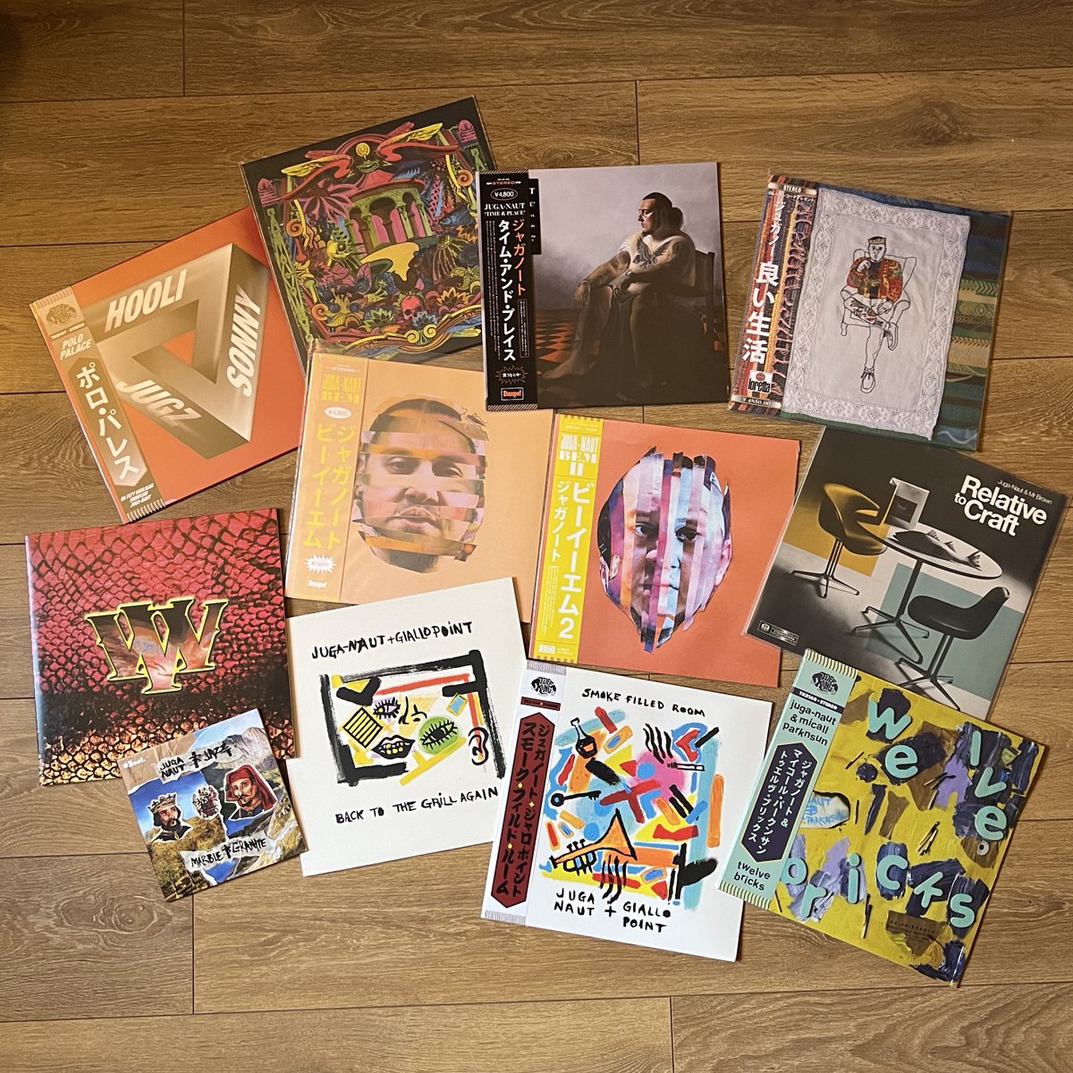 Juganaut's tweet photo. The super heavy weight catalogue. Ive been putting out music officially since 2006, it’s the long game and iv’e been trying my best, 20+ projects deep. This is the art in the physical form, taking stock of what ive achieved, and right now trying construct where im heading. https://t.co/oVSNWTIS84