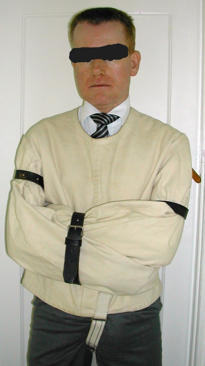 DanWales7's tweet photo. 1/2 Straitjackets look hot &amp; feel great to wear, tighter the better, but what was their purpose? It was to hold the wearer's arms crossed over round his body, hands unusable, so he couldn't hurt himself or others.  A lot of canvas, leather or rubber to achieve that simple aim! https://t.co/5G6pcRaSBE
