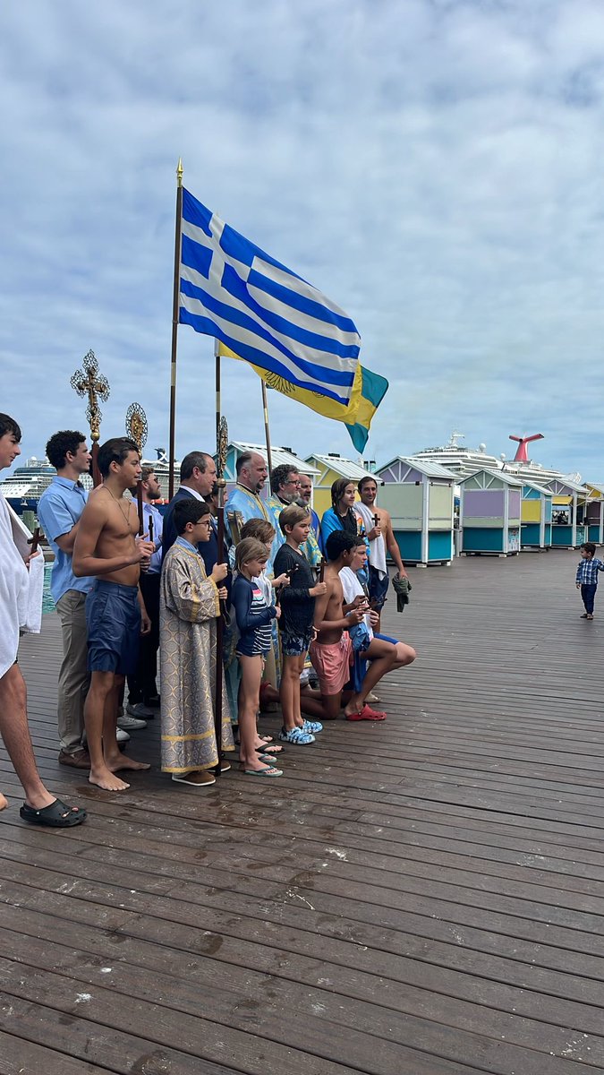 FrEliasVillis's tweet photo. It was a profound honor to represent His Eminence Archbishop @Elpidophoros of America this weekend at the Annunciation Church in Nassau, Bahamas. Together with this amazing and faithful community, we celebrated the blessing of the ocean waters with the Holy Cross and the sanctifying grace of Agiasmo. A highlight of the day was witnessing the enthusiasm and faith of the youth as they dove into the ocean waters to retrieve the Cross. This sacred tradition serves as a reminder of the presence of our Lord and Saviour Jesus Christ in all creation and His baptism in the Jordan River. May the blessings of this day bring peace and renewal to all who were present and to the beautiful waters of the Bahamas.  Xronia Polla!