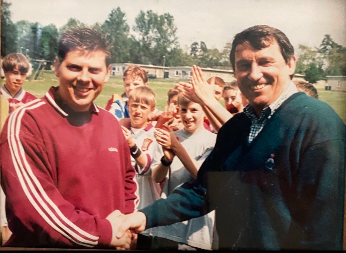 MR_WFC's tweet photo. It’s that time of year when we pay homage to the great man. 

I was lucky enough to meet GT many times, including below when he came over to Germany to meet us. 

Quite simply, the man who made @WatfordFC 

Sorely missed. 

#GT 
#RIPGT ❤️ https://t.co/APfHakYP4M