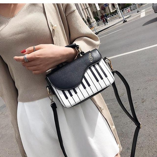 UnicunShop's tweet photo. 🎶 Hit all the right notes with our new Piano Shaped Bag! 🎹 This adorable bag is perfect for music lovers & holds all your essentials. Check it out: https://t.co/jcKHMO4bPJ #pianobag #musiclover #fashion #accessories 👜 https://t.co/vYDCRVxAGA