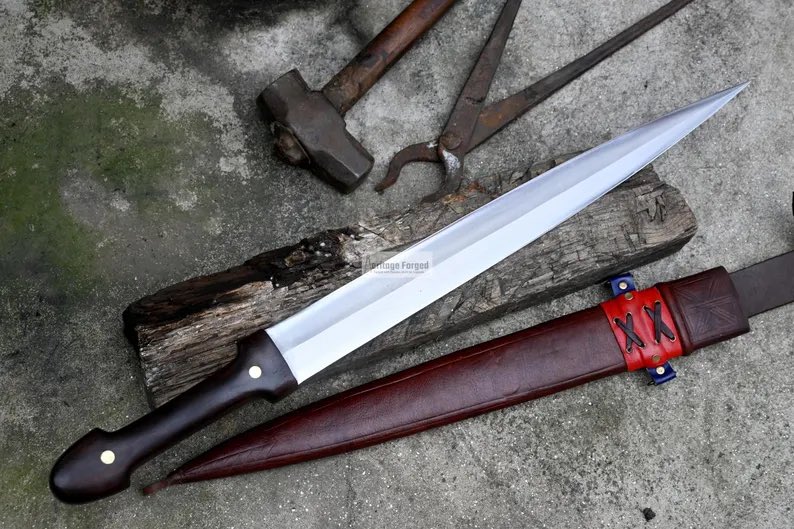 BladeEverest's tweet photo. https://t.co/CiN6gr0EeV

#KindajalSword #HandForgedSword #18InchBlade #LeafSpringSteel #HandmadeSword #Machete #CustomSword #WaterTempered #SharpenedSword #KnifeCollection #SurvivalGear #OutdoorTools #UniqueWeapons #WeaponArt #Handcrafted #HistoricalWeapons #SteelCraftsmanship https://t.co/WGQiUV0aRM