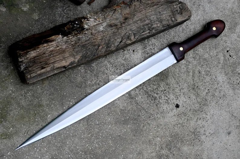 BladeEverest's tweet photo. https://t.co/CiN6gr0EeV

#KindajalSword #HandForgedSword #18InchBlade #LeafSpringSteel #HandmadeSword #Machete #CustomSword #WaterTempered #SharpenedSword #KnifeCollection #SurvivalGear #OutdoorTools #UniqueWeapons #WeaponArt #Handcrafted #HistoricalWeapons #SteelCraftsmanship https://t.co/WGQiUV0aRM