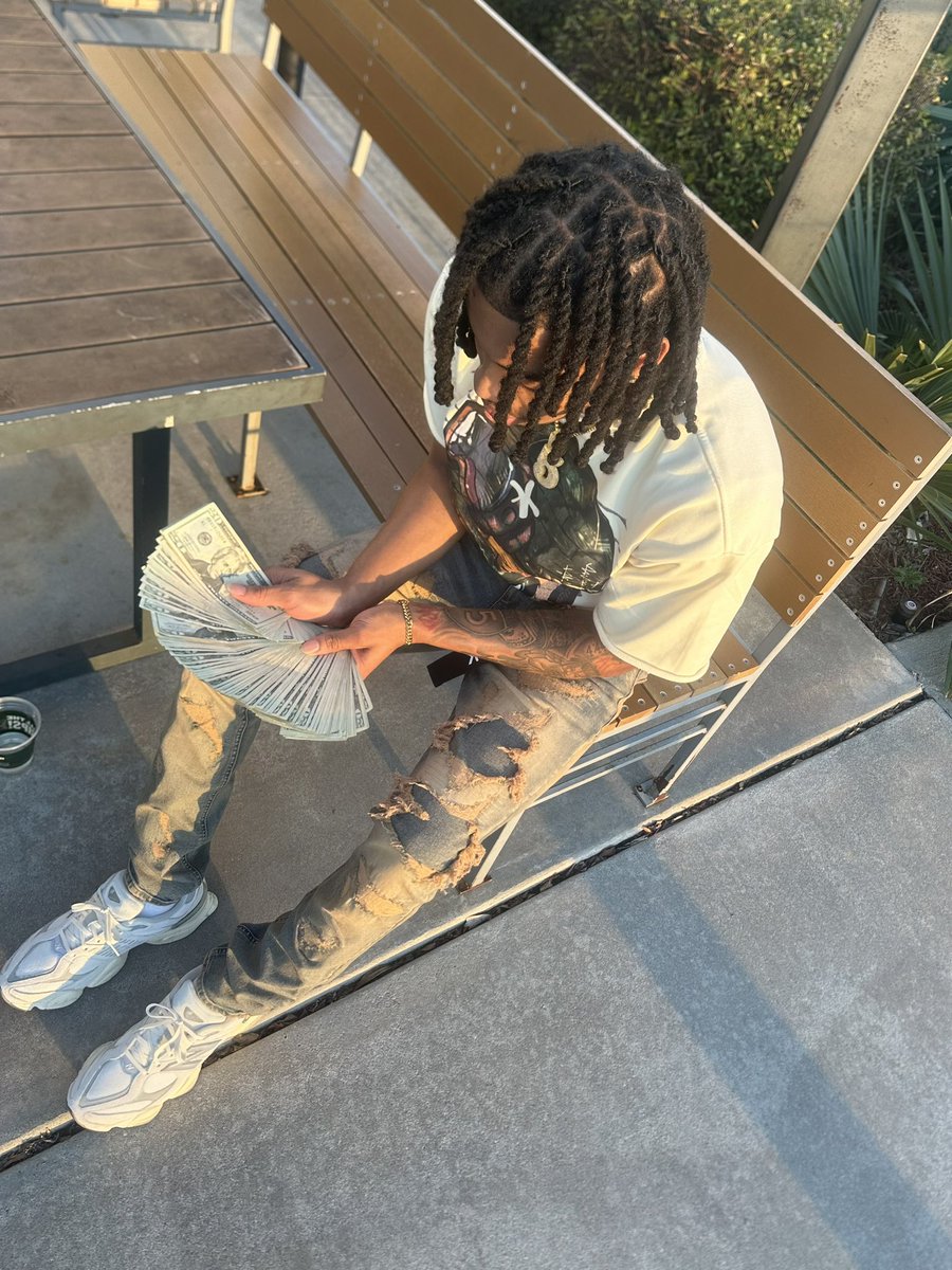 A tatted dreadhead ❤️‍🔥