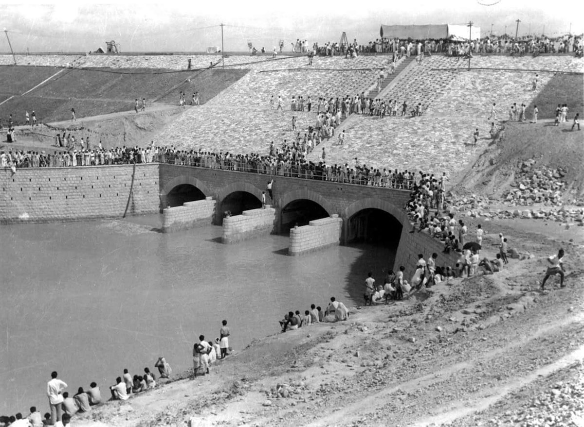 dpradhanbjp's tweet photo. The Hirakud Dam on Mahanadi, an engineering marvel, was dedicated to the country today in the year 1957. 

The longest earthen dam in the world, it stands as an edifice of India’s engineering excellence. One of the first major multipurpose dam, it is a harbinger of water management, irrigation, flood control, food security, sustainability, economic growth and development in Odisha. As the Hirakud Dam rings its 69th birthday, sharing some pictures of it during its construction phase. Hirakud Dam over Mahanadi is not just a brick and mortar structure, it is the lifeline of Odisha! 

#69thBirthday #HirakudDam #Mahanadi #Sambalpur