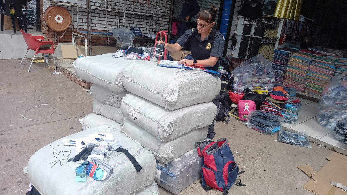 CrimeWatch_RSA's tweet photo. [POLICE SEIZE COUNTERFEIT GOODS WORTH OVER R5 MILLION AND ARREST FOUR SUSPECTS DURING AN OPERATION IN MUSINA]

This week, the South African Police Service (SAPS), in collaboration with its crime-fighting partners, conducted a successful operation in Musina, Limpopo, leading to the seizure of counterfeit and illicit goods valued at over R5 million.

The operation was spearheaded by the National Counterfeit Goods Unit, with support from the SAPS Gauteng Drone Team, the Bloemfontein K9 Unit, the South African Revenue Service (SARS) Customs, and brand protectors.

A MAJOC roving team comprising of SAPS members from spesialised units deployed in Limpopo as part of OPERATION VALA UMGODI also participated. While primarily tasked with addressing crimes associated with illicit mining, these members contribute to combating a broader range of criminal activities in the province.

On Sunday, 12 January 2025, the team executed a search-and-seizure warrant at a shopping mall in Musina's central business district (CBD).

During the operation, more than 2 000 counterfeit and illicit items, including sneakers, clothing, cell phone accessories, perfumes, and consumables, were confiscated.

Two Eritrean nationals and one Bangladeshi national, all asylum seekers, were arrested for dealing in counterfeit goods. The Bangladeshi national faces an additional charge for bribery, after he attempting to bribe officers at the scene to evade his arrest.

On the same day, the team stopped and searched vehicles in the area which led them to arrest a suspect for possession of a stolen vehicle. The members also seized dagga and drugs found abandoned in a taxi after the driver and commuters fled the scene on foot.
