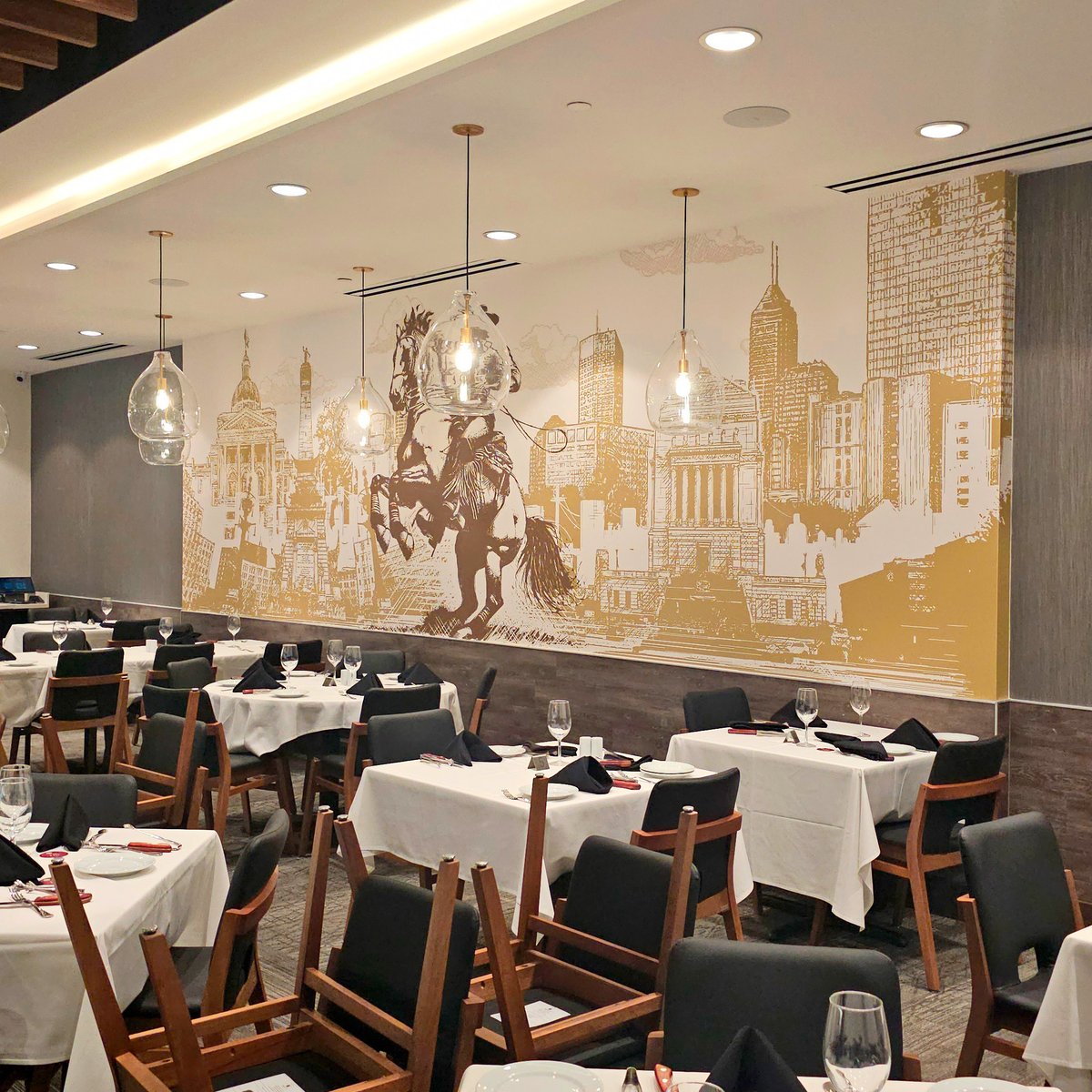 AstekInc's tweet photo. @TerraGauchaUSA's newest location in Indianapolis offers "the ultimate Churrasco experience," with various cuts of meat roasted on an open flame and carved tableside. On the dining room wall, check out a custom mural printed by Astek. Interior: Sol Design Studio + @KortBuilders https://t.co/gkusVrNPe3