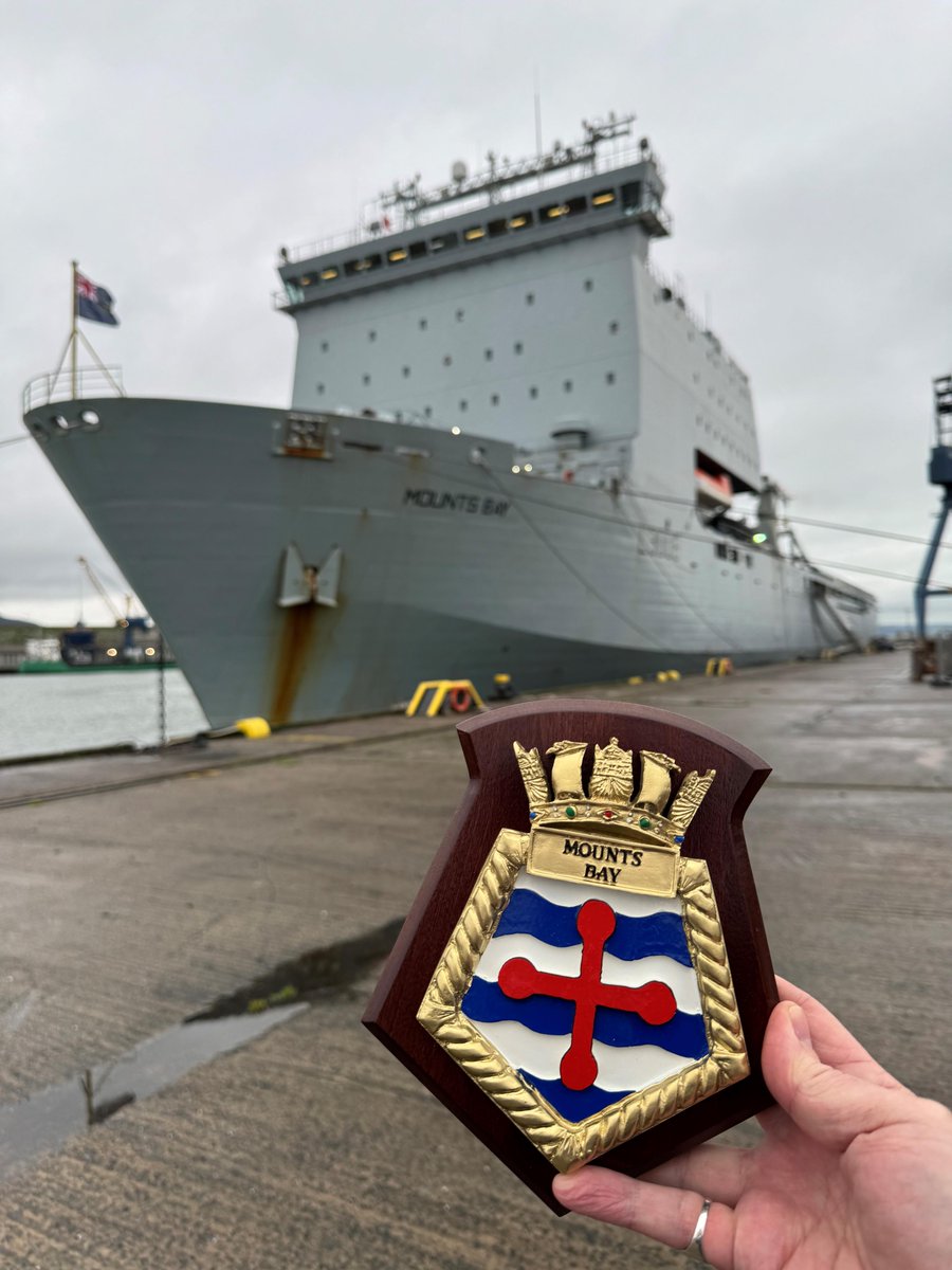 BelfastHarbour's tweet photo. Our Commercial Executive Gary Hall joined Captain James Allen and Senior Naval Officer for Northern Ireland, Tom Wardley, aboard @RFAMountsbay for the traditional plaque exchange to mark the vessel's inaugural call to Belfast. The vessel has been berthed at Harland & Wolff since 23rd December for crew R&R and routine maintenance.

Built in 2004 and operated by the Royal Fleet Auxiliary, RFA Mounts Bay is an amphibious support vessel, which plays a vital role in humanitarian aid, disaster relief, and military operations worldwide. Her call to Belfast highlights the city's importance in welcoming globally significant vessels and strengthening maritime ties.