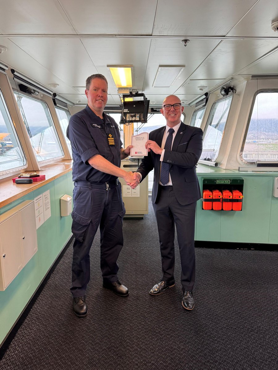BelfastHarbour's tweet photo. Our Commercial Executive Gary Hall joined Captain James Allen and Senior Naval Officer for Northern Ireland, Tom Wardley, aboard @RFAMountsbay for the traditional plaque exchange to mark the vessel's inaugural call to Belfast. The vessel has been berthed at Harland & Wolff since 23rd December for crew R&R and routine maintenance.

Built in 2004 and operated by the Royal Fleet Auxiliary, RFA Mounts Bay is an amphibious support vessel, which plays a vital role in humanitarian aid, disaster relief, and military operations worldwide. Her call to Belfast highlights the city's importance in welcoming globally significant vessels and strengthening maritime ties.