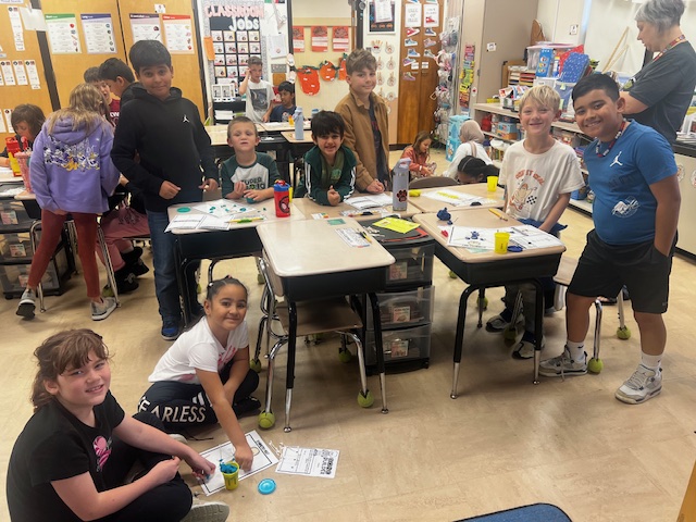 Mrs. Cancelliere's First Graders and Mrs. Ziegenfus's Fourth Graders got together in October for some spooky fun with symmetry with the story of Bonaparte Falls Apart!