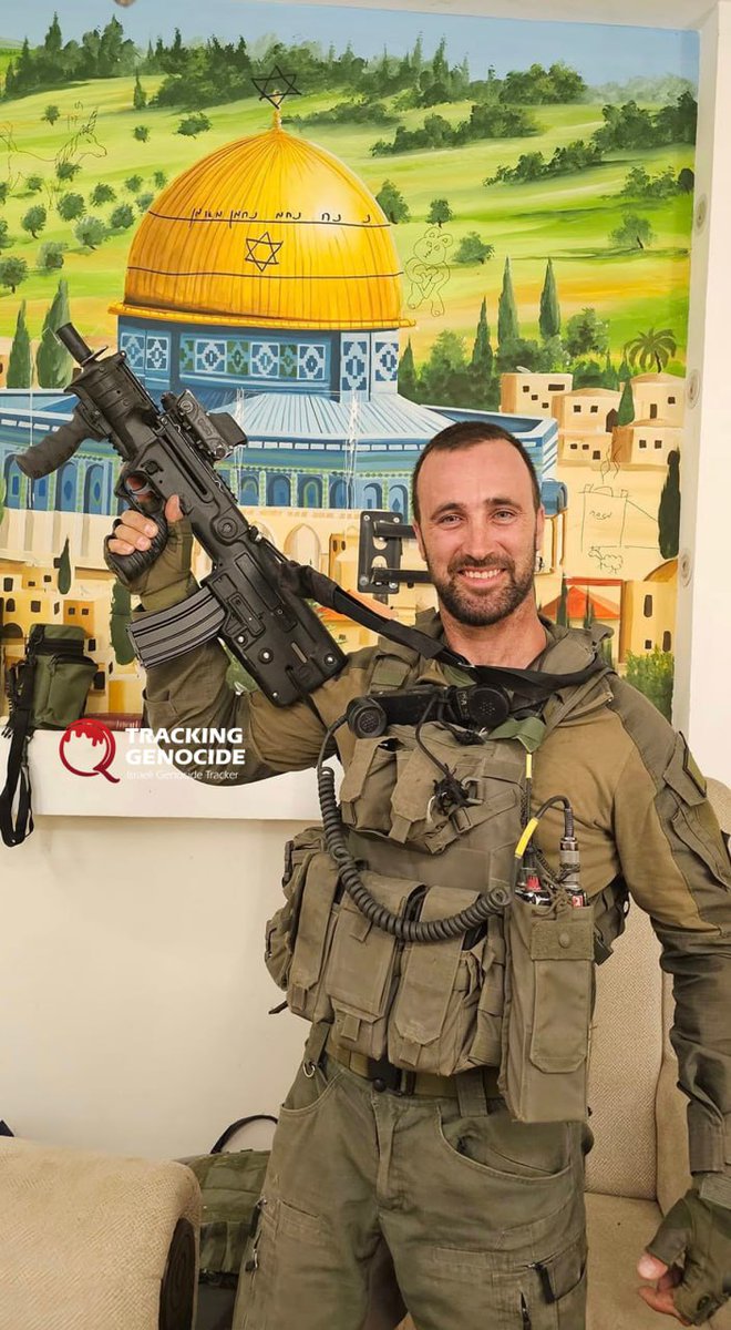 trackingisrael's tweet photo. Israeli Ukranian reservist Eliyahu Cherniavsky posted this image of himself next to a vandalized painting of Al-Aqsa Mosque inside a displaced Palestinian home in Rafah.

The painting was defaced with Talmudic verses and a Star of David on its dome. https://t.co/lH6wkIRDJX