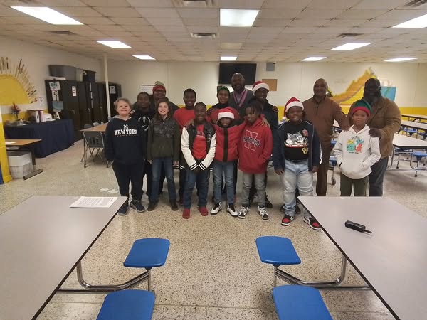 APTysinger's tweet photo. Thank you to Dr. Rodney Brown and all our dedicated mentors for joining us at our December Becoming a Man meeting to discuss showing compassion.  We appreciate your time, wisdom, and support in helping our youth grow into compassionate leaders. 
#EFESProud #SPSCreatesAchievers https://t.co/MJtM9DxlPB