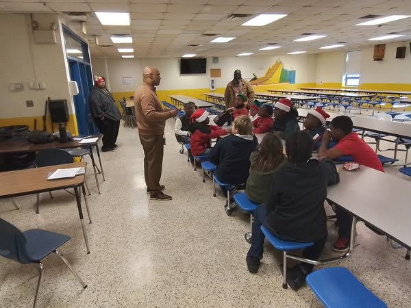 APTysinger's tweet photo. Thank you to Dr. Rodney Brown and all our dedicated mentors for joining us at our December Becoming a Man meeting to discuss showing compassion.  We appreciate your time, wisdom, and support in helping our youth grow into compassionate leaders. 
#EFESProud #SPSCreatesAchievers https://t.co/MJtM9DxlPB