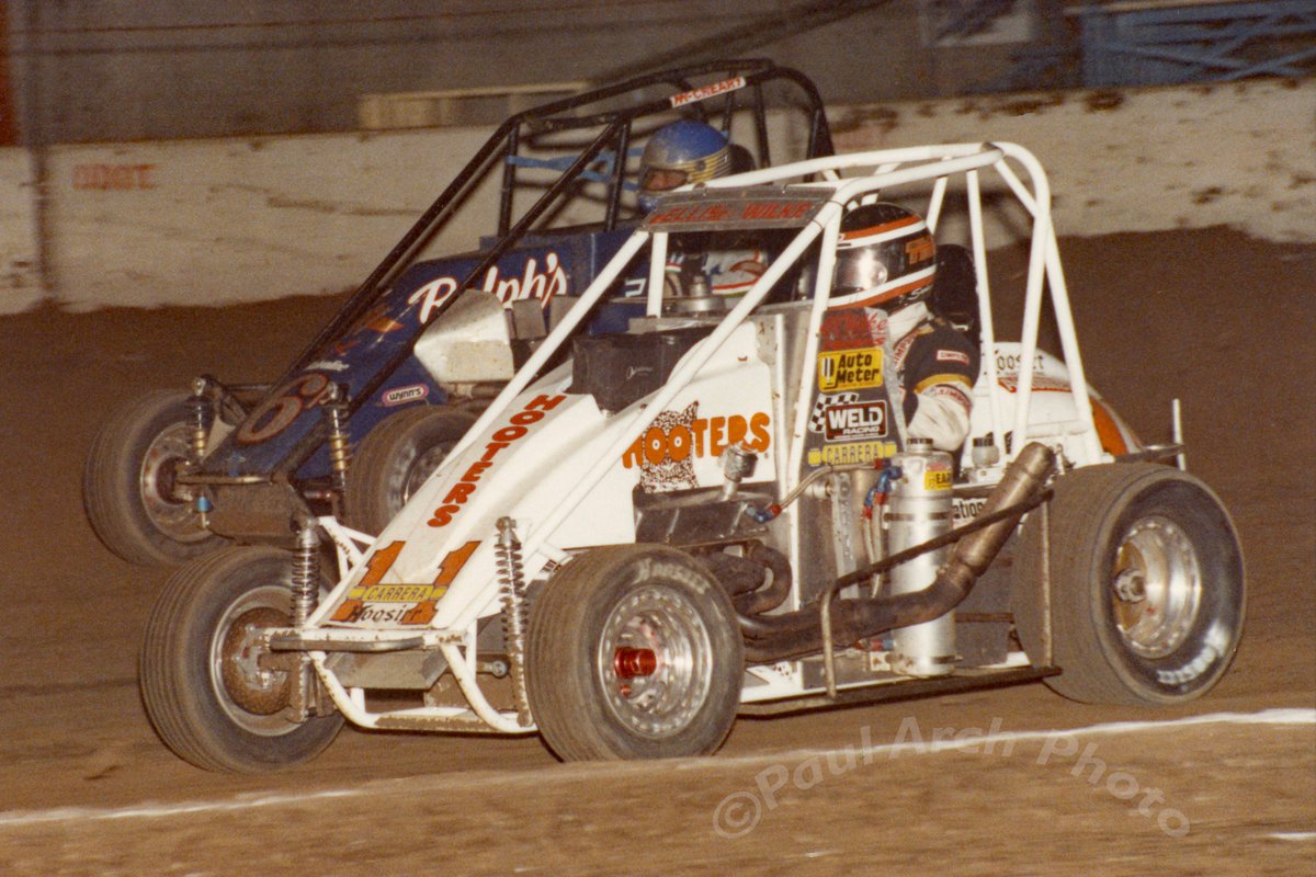 January 7, 1993 - <a href="/cbnationals/">Chili Bowl Nationals</a> <a href="/BuckeyeBullet10/">Dave Blaney</a> <a href="/1sam91/">Sam Swindell</a> <a href="/hosehead33/">Allan Holland "Hoseheads"</a> <a href="/SprintCarNews/">SprintCarNews.com</a> <a href="/UsaSprint/">SprintCarUSA</a> Sammy Swindell races inside Dave Blaney at the 1993 Chili Bowl