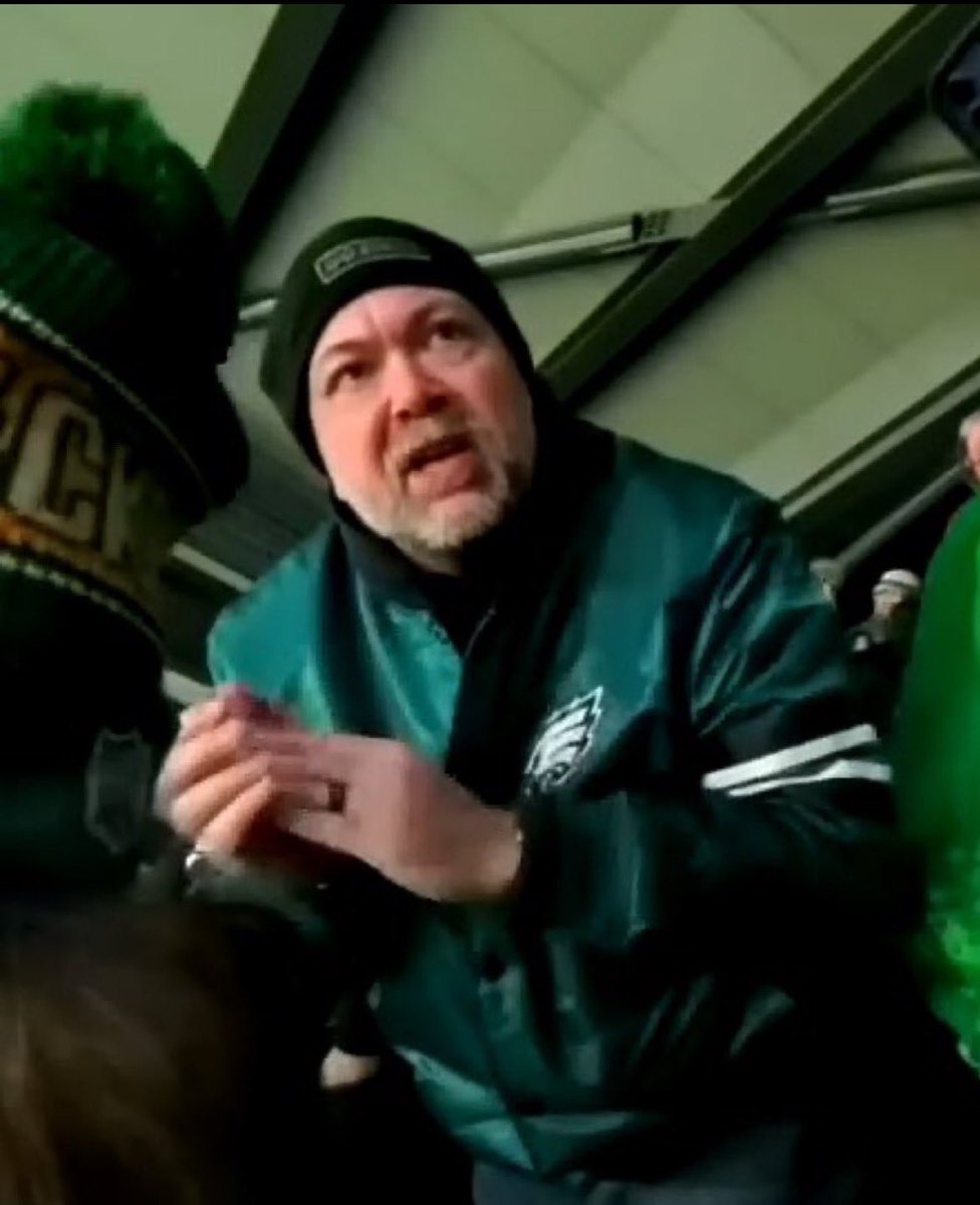 Eagles fan Ryan Caldwell caught harassing Packers fan during wild card game. (Via Twitter)