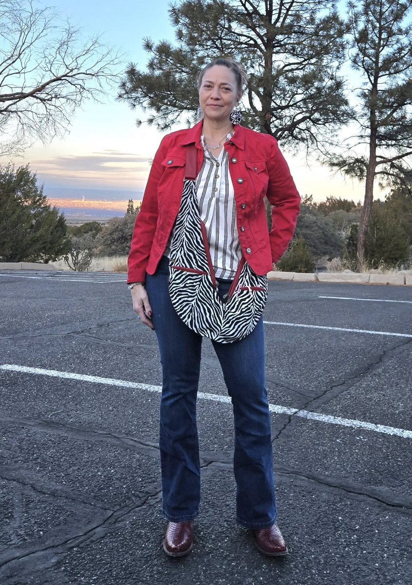 Be courageous in all you do!
"I never really considered myself someone who can pull off the color red. As I've gotten older, I decided that I don't care, and I wear what I like. My zebra/red Sash paired with my red denim jacket and red boots give me all the feels today."