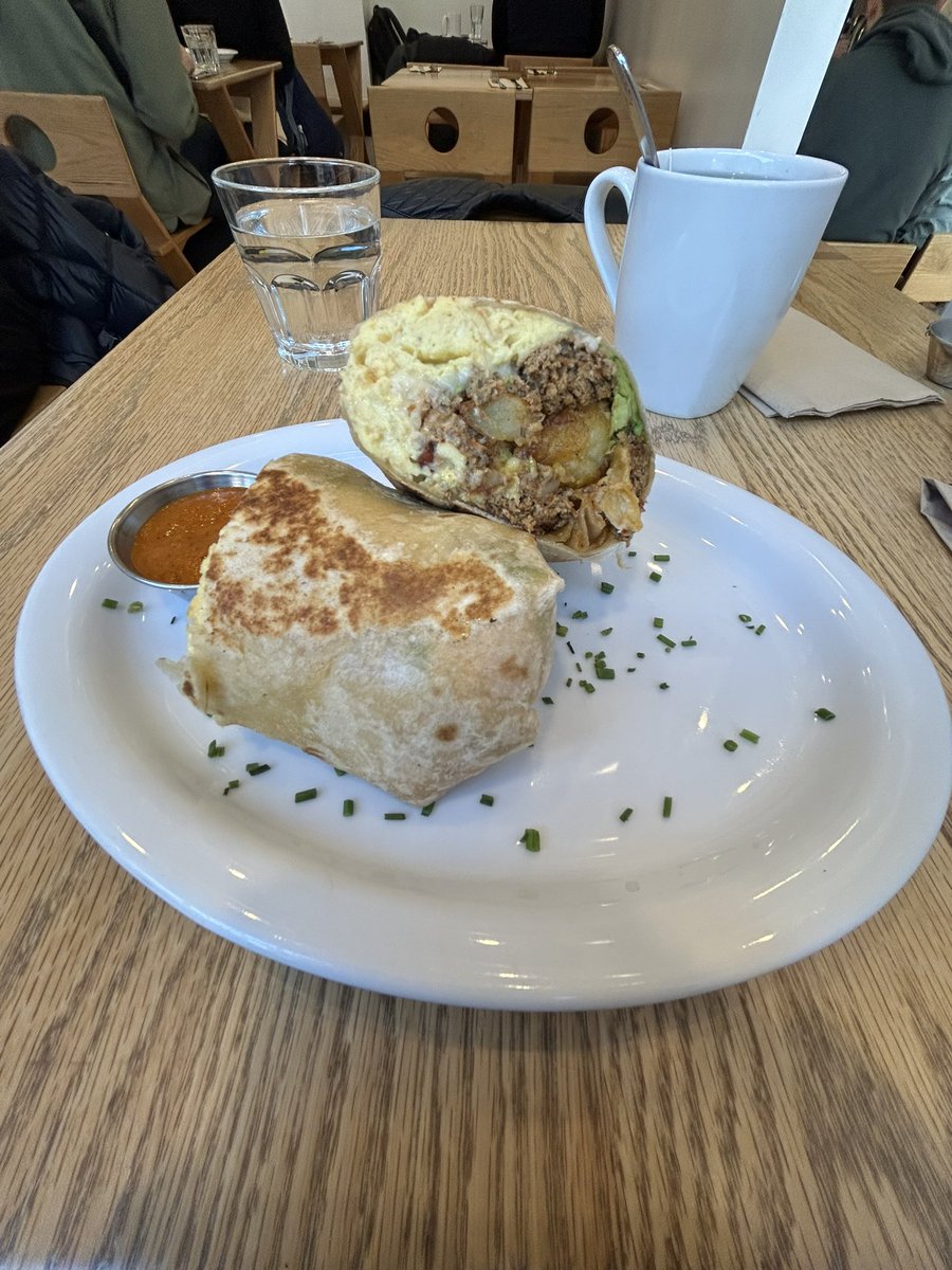 GrinsteinJ's tweet image. Been dreaming about their breakfast burrito for 2 years from @HeistCoffee because they were closed for renovations last #JPMHC.