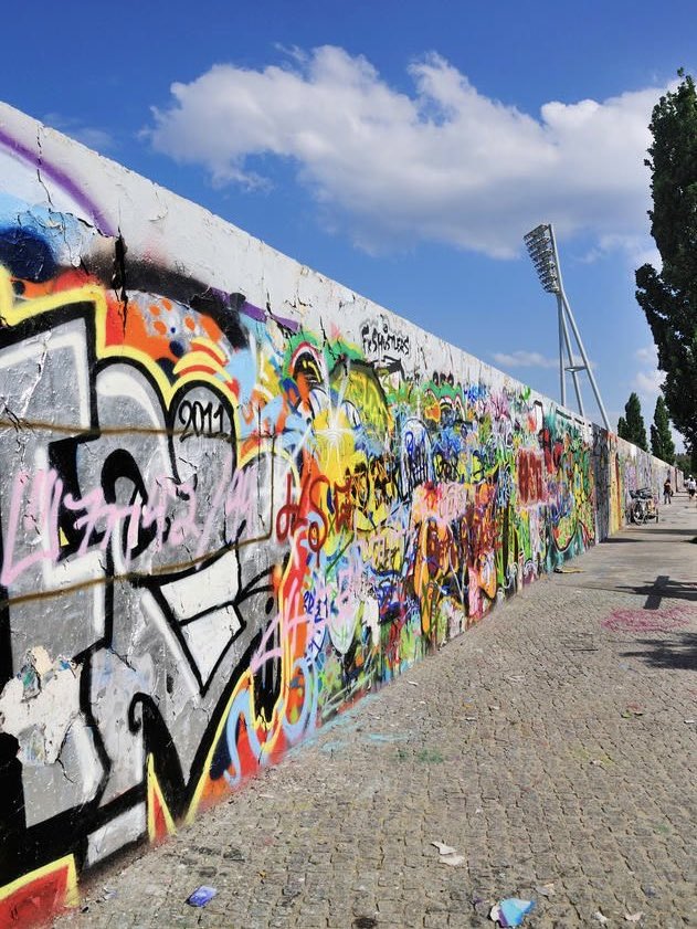 The Berlin Wall was constructed in 1961 to halt the large-scale emigration from East Germany to West Germany. Its collapse in 1989 represented a significant turning point, marking the conclusion of the Cold War in Europe.