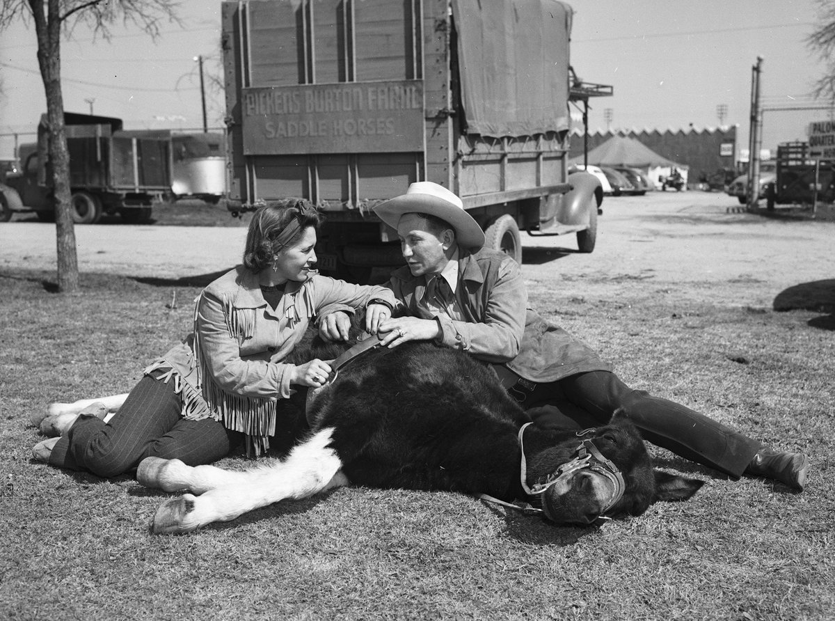 It's opening day of the 2025 <a href="/FWSSR/">FWSSR</a>! 🤠

Legendary rodeo performer Tad Lucas, pictured at the 1945 Southwestern Exposition &amp; Fat Stock Show, is seen lounging with rodeo clown Homer Holcomb &amp; his trick mule, Parkurkarkus.

[📸: Star-Telegram Collection, library.uta.edu/digitalgallery…]