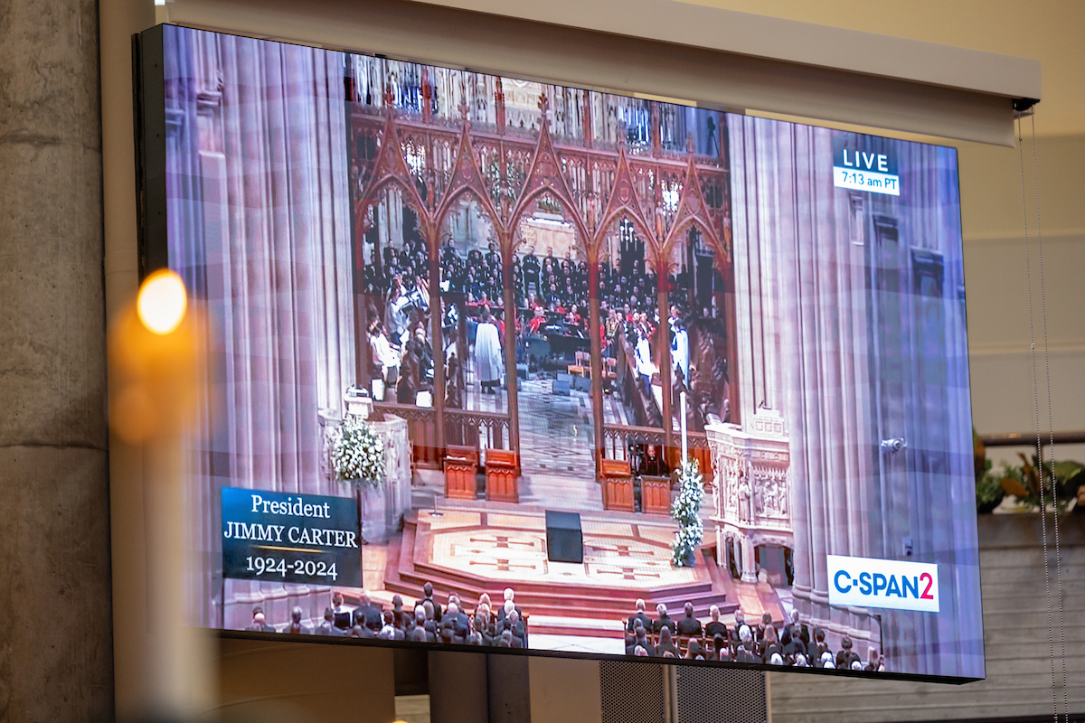 EmoryUniversity's tweet photo. This past Thursday Emory faculty, staff, students and community members gathered at Cannon Chapel to watch the televised memorial service for President Jimmy Carter together and to share their memories and reflections. https://t.co/8yDyyz1Hue #CarterAtEmory https://t.co/gozZYrPowA