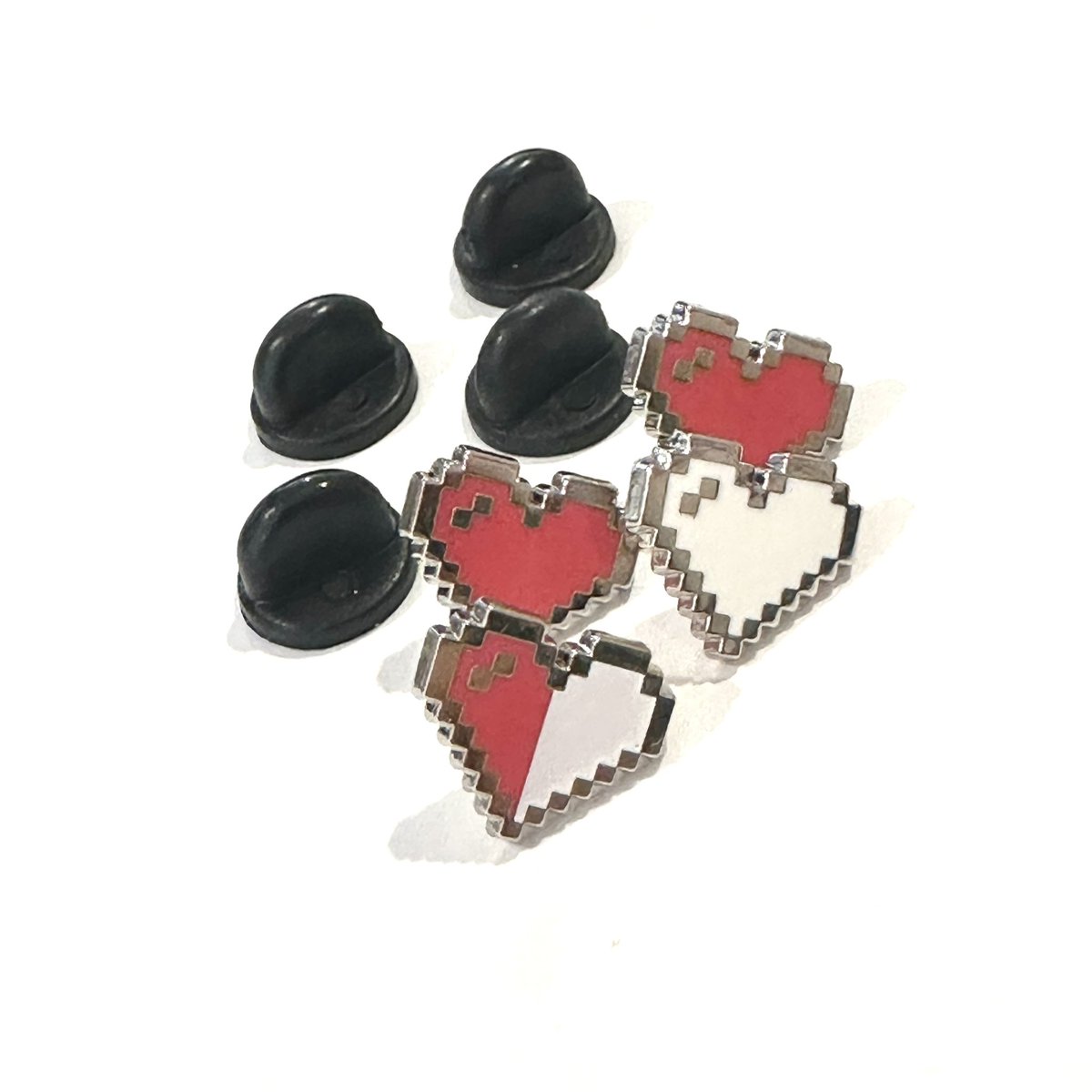 RPG Hearts Filler enamel pins are great for your board or Ita Bags! They’re 0.5” each and perfect for the small holes between your display! :)

Available at ollybits.com and wholesale on Faire!

#pixelart #smallbusiness #wholesale #ollybits