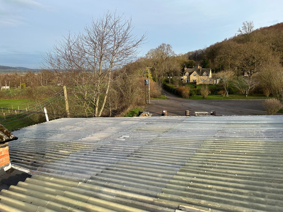 Overclad to asbestos sheeting due to storm damage and complete replacement of existing felt box gutter with new high performance mineral felt.