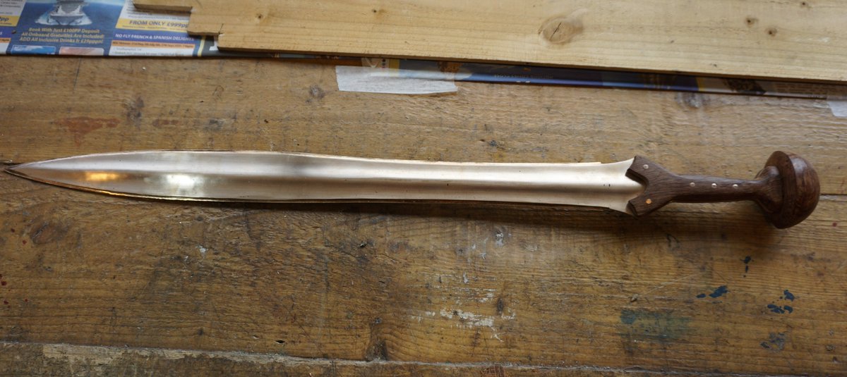 neil_burridge's tweet photo. This was a miss cast blade, i sold way back, it passed through many hands and acquired a rubbish handle with huge iron rivets. While staying with a friend who was the current owner i decided to fit a better handle  recover the edge and finish the blade  turned out gorgeous sword https://t.co/akQd92QgGG