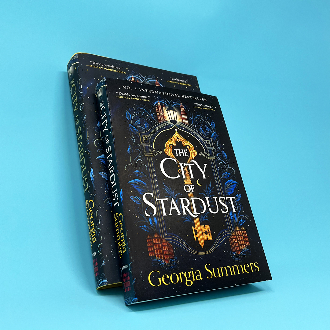 A curse can be many things. For the Everlys, it begins with stardust. Slip into a lush world of magic and monsters in this standalone contemporary fantasy. 

THE CITY OF STARDUST by <a href="/ge_summers/">Georgia Summers</a> is available now in paperback!