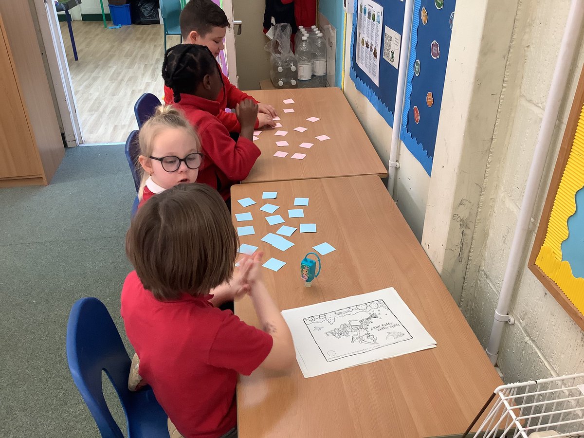 P3and 4 enjoying lunchtime story club with Mrs Nash and Mrs Grant.