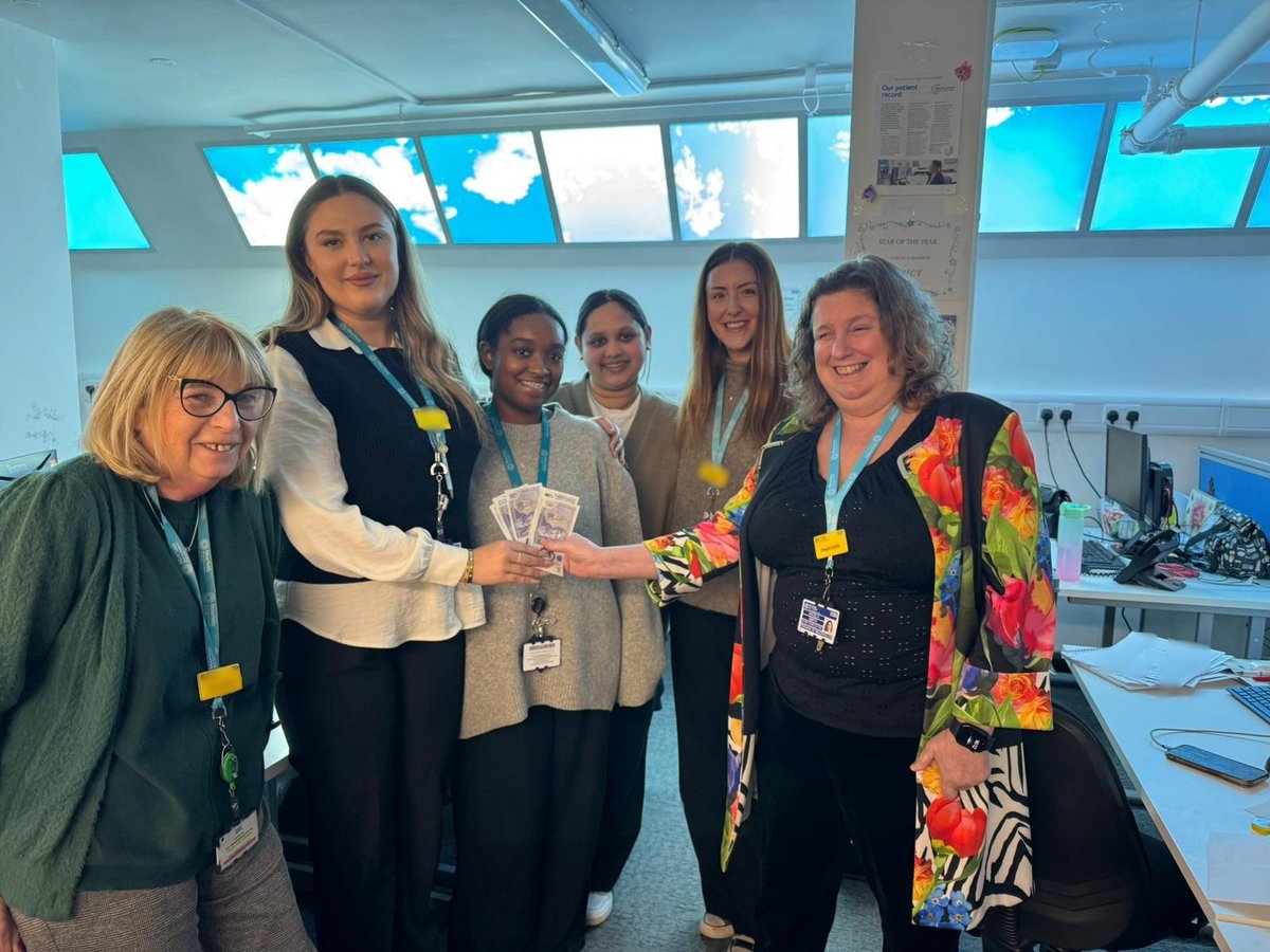 Part of our work is to support staff wellbeing at Moorfields, including by providing prizes for the Christmas tree contest. 

Congratulations to the adnexal and ocular oncology admin team, who won first place this time  - here's our chief exec Angela Smith delivering their prize!